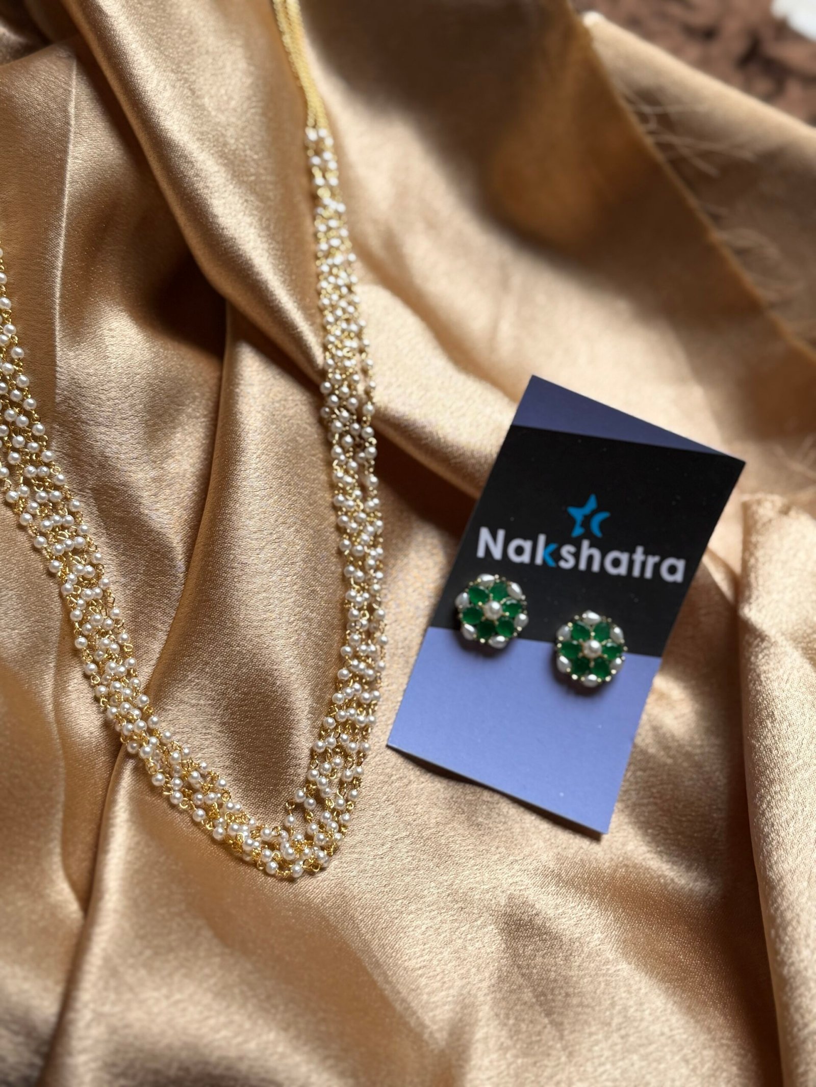 Pearl mala in layers with green earring