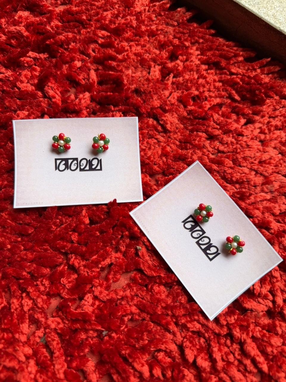 Pearl coral and emerald stud
