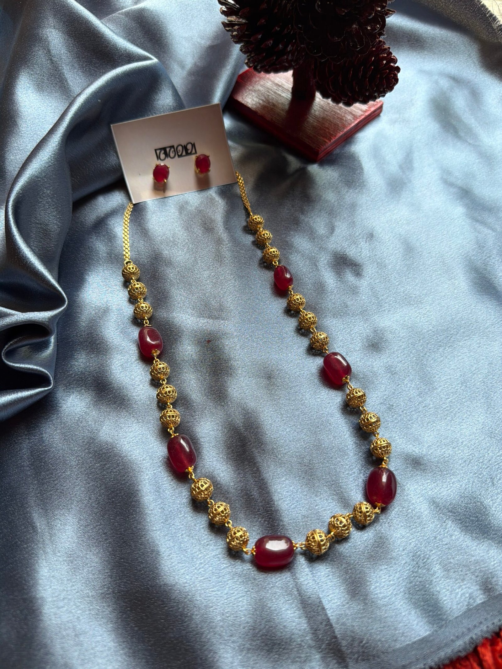 Reddish maroon chain with earring
