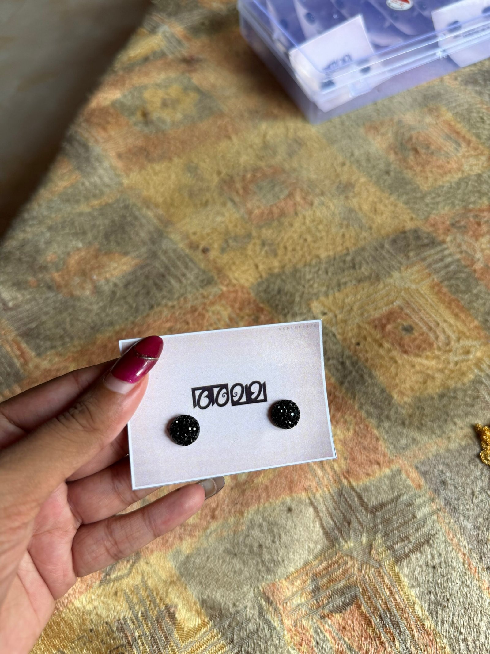 Black ear stud