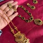 Pearl and antique gold pendant set